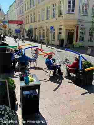 German café finds hilarious way to encourage social distancing