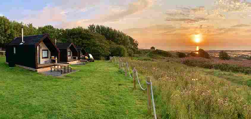 Go off-the-grid with these English seaside huts